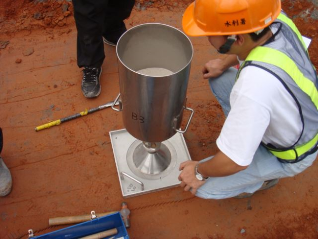 Fig.2 Field density test (sand-cone method)