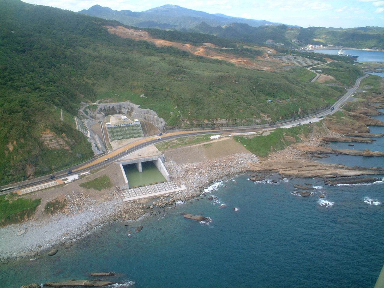 Aerial view of the Yuanshanzi flood diversion outlet (physical model experiment completed by Hydo&Geo-Tech Experimentation Section in 2003)._Icon